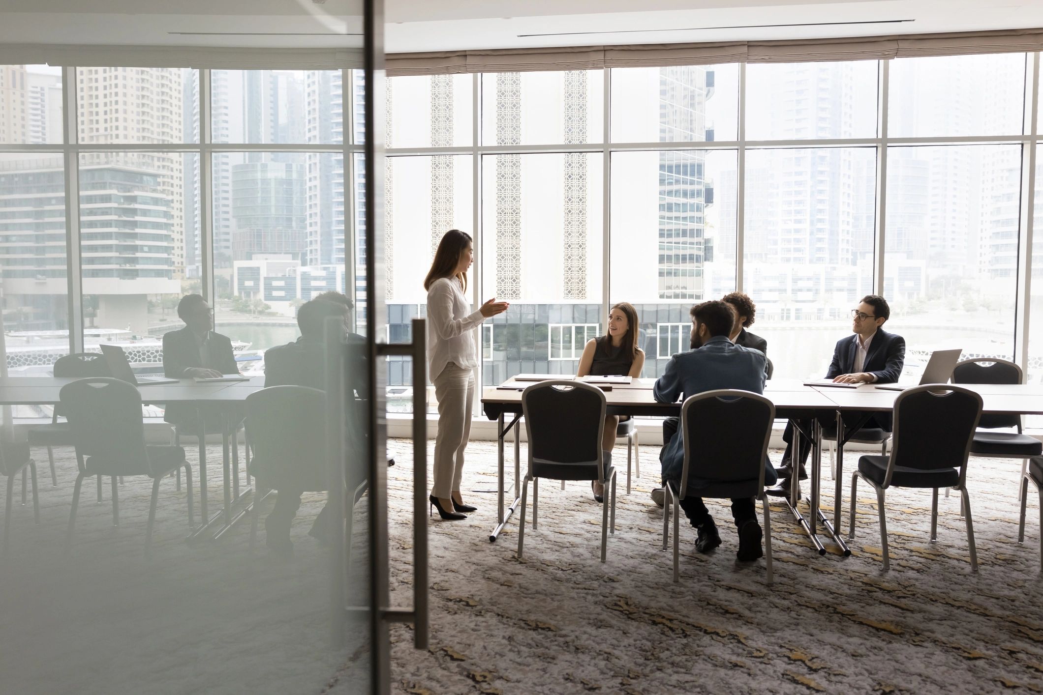 Healthcare executives meeting around a conference table